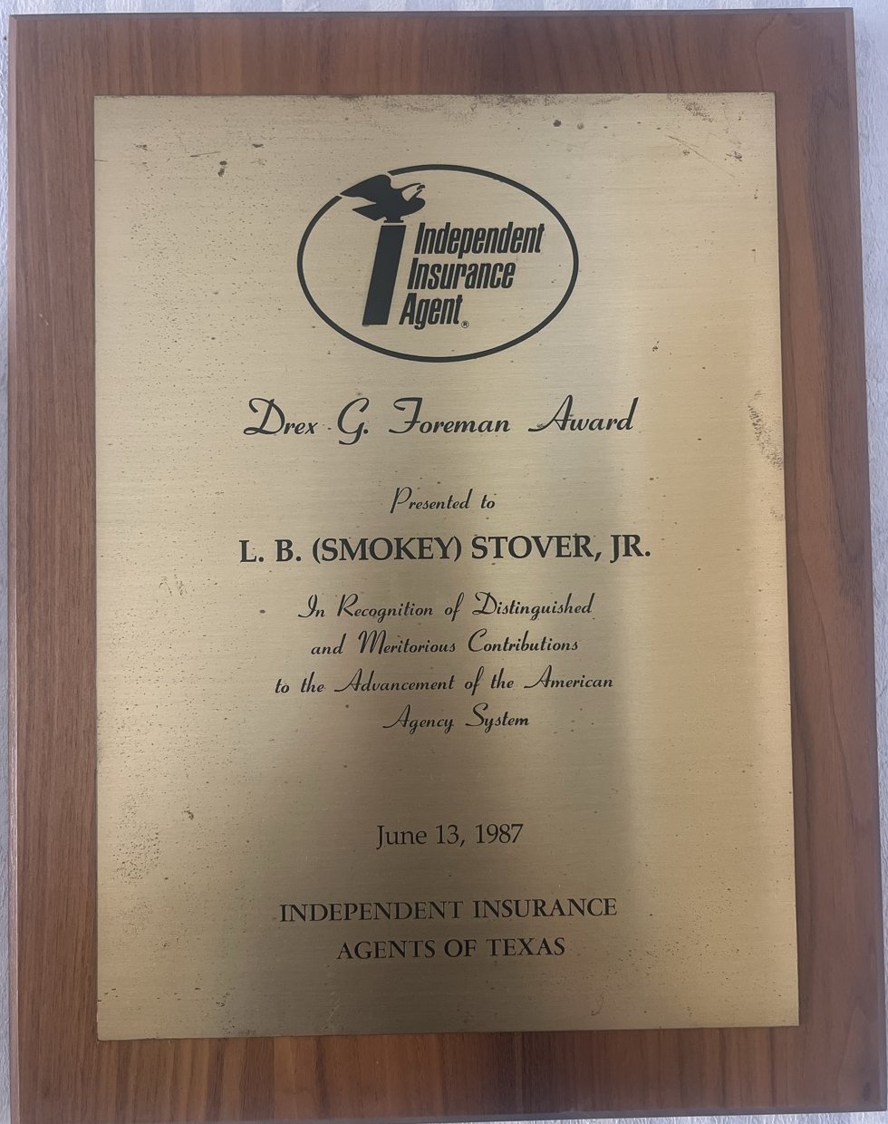 Drex G. Foreman Award plaque presented to L. B. Smokey Stover Jr. by the Independent Insurance Agents of Texas, June 13, 1987